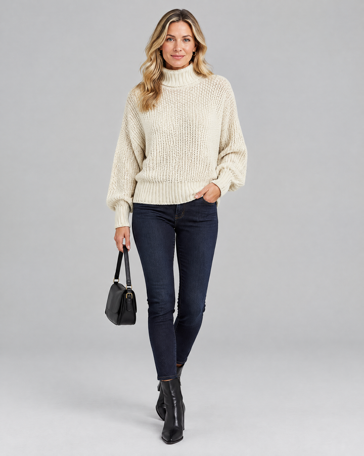 Chunky Waffle Knit High Neck Jumper in Cream – front view